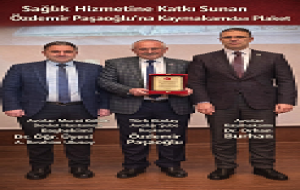  Sağlık Hizmetine Katkı Sunan Özdemir Paşaoğlu’na Kaymakamdan Plaket